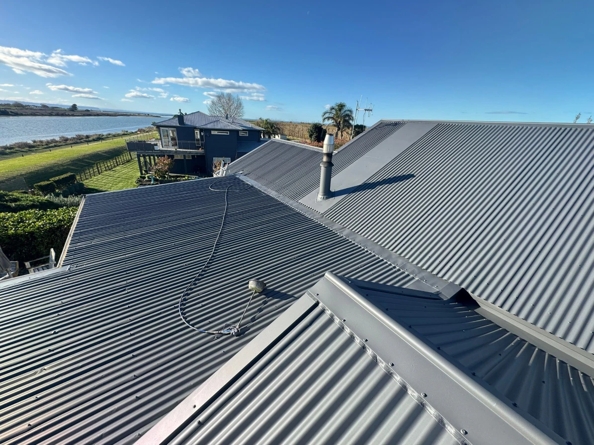 Close-up of Guardian Seal liquid membrane coating applied to a roof